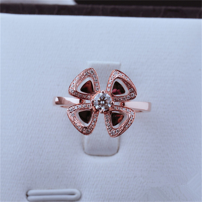 Roman Love Flower Ring Fiorever 18 kt Rose Gold Ring set with a central diamond and pavé diamonds