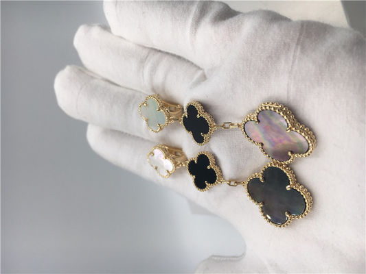 Quality Van Cleef Arpels Magic Alhambra earrings 18k yellow gold with white and gray mother-of-pearl factory