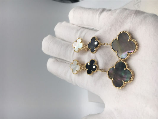 Quality Van Cleef Arpels Magic Alhambra earrings 18k yellow gold with white and gray mother-of-pearl factory