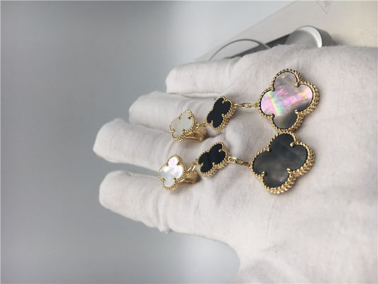 Quality Van Cleef Arpels Magic Alhambra earrings 18k yellow gold with white and gray mother-of-pearl factory